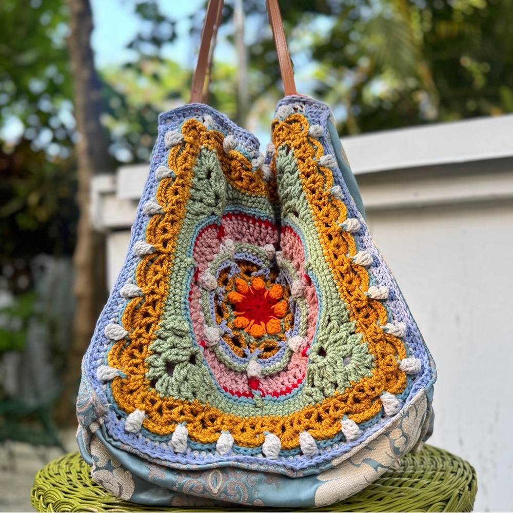 Hand Crafted Orange and Green Shoulder Bag with Intricate Embellishments
